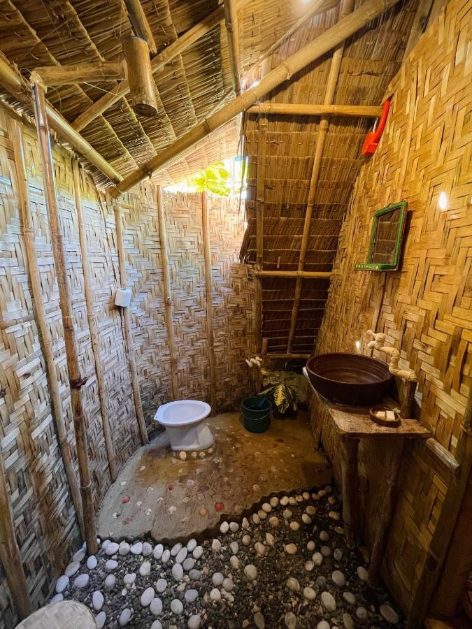 Ostello Tribal Huts Community Daanbantayan Esterno foto