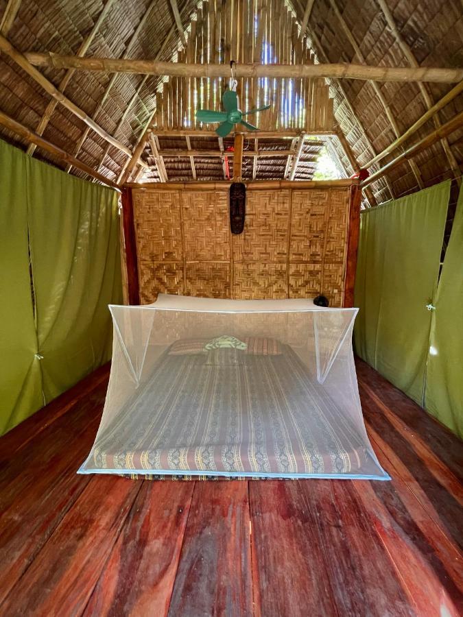 Ostello Tribal Huts Community Daanbantayan Esterno foto