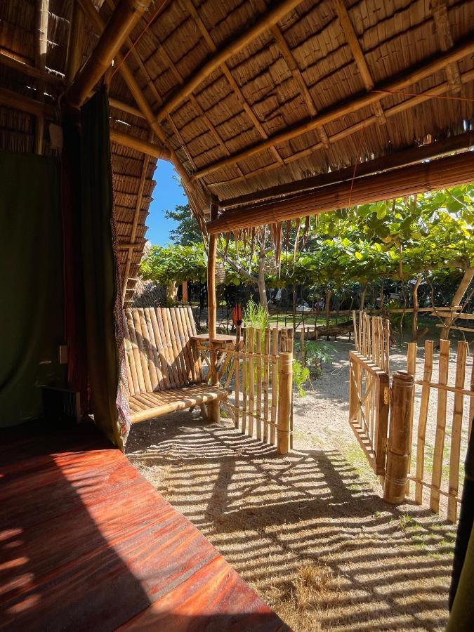 Ostello Tribal Huts Community Daanbantayan Esterno foto