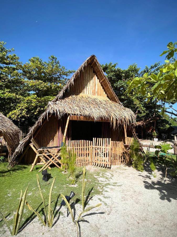 Ostello Tribal Huts Community Daanbantayan Esterno foto
